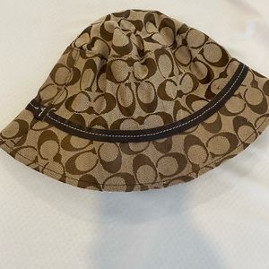 Tan Coach bucket hat from the early 2000s